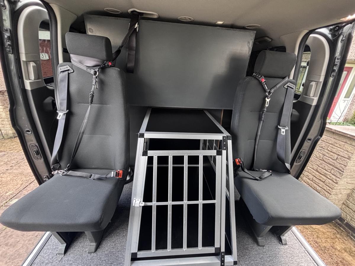 Interior setup of Pawfect Taxis pet transport vehicle with secure travel layout